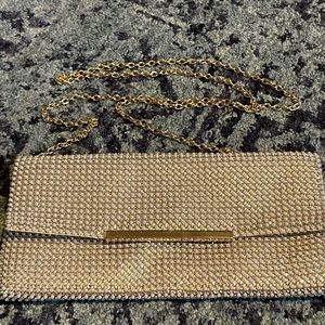 Silver dazzle clutch w/ gold chain! Used for wedding day only. Great condition!